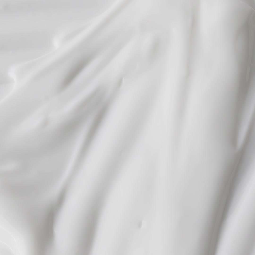 Macro video of Night Repair Therapy cream. The video shows the soft velvety texture being smeared by a cosmetic knife.